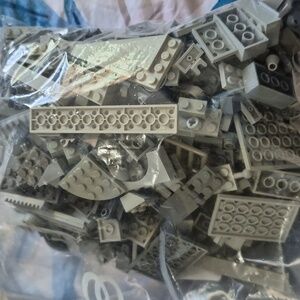 Assorted Gray Bag Of Legos